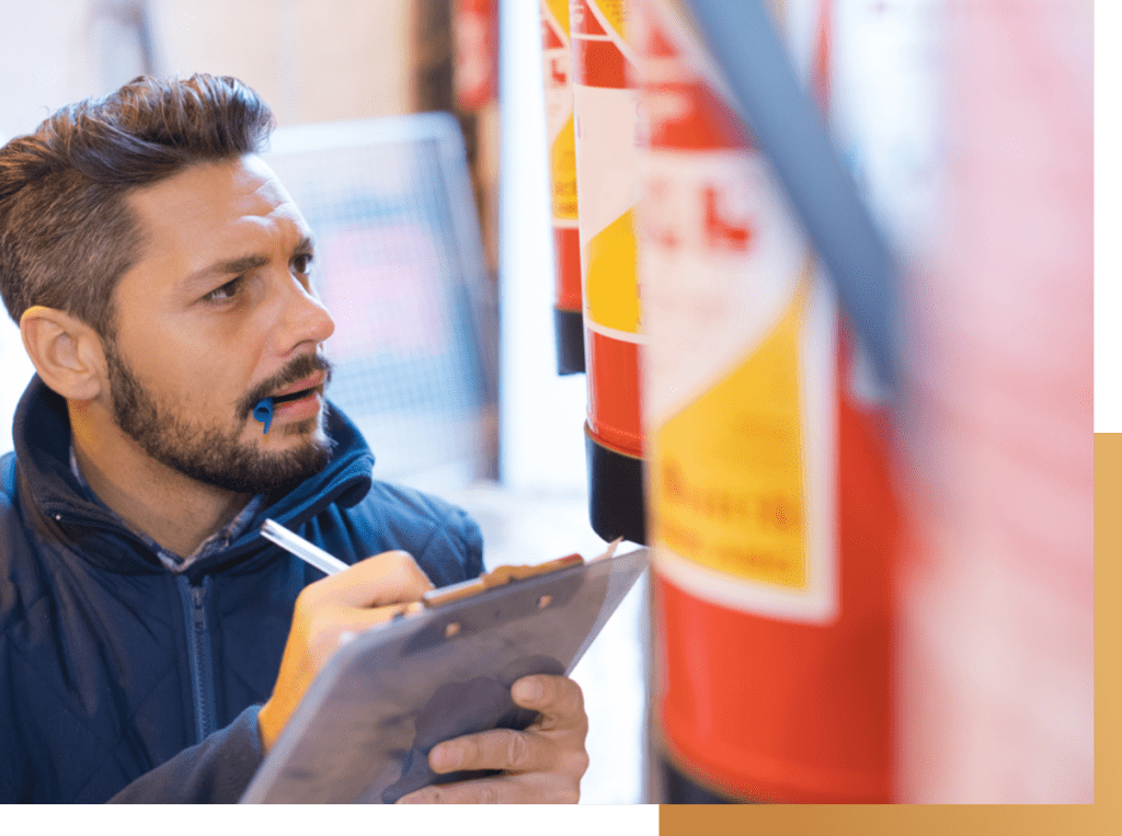 employee checking product details with tip of pen on his mouth