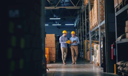 men walking around a facility to see what maintenance should be done