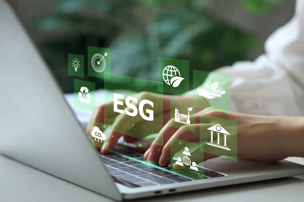 ESG environmental social governance for facilities business concept. Facility Manager working on laptop computer with ESG icons surround. Facility management for Business and environmental sustainability