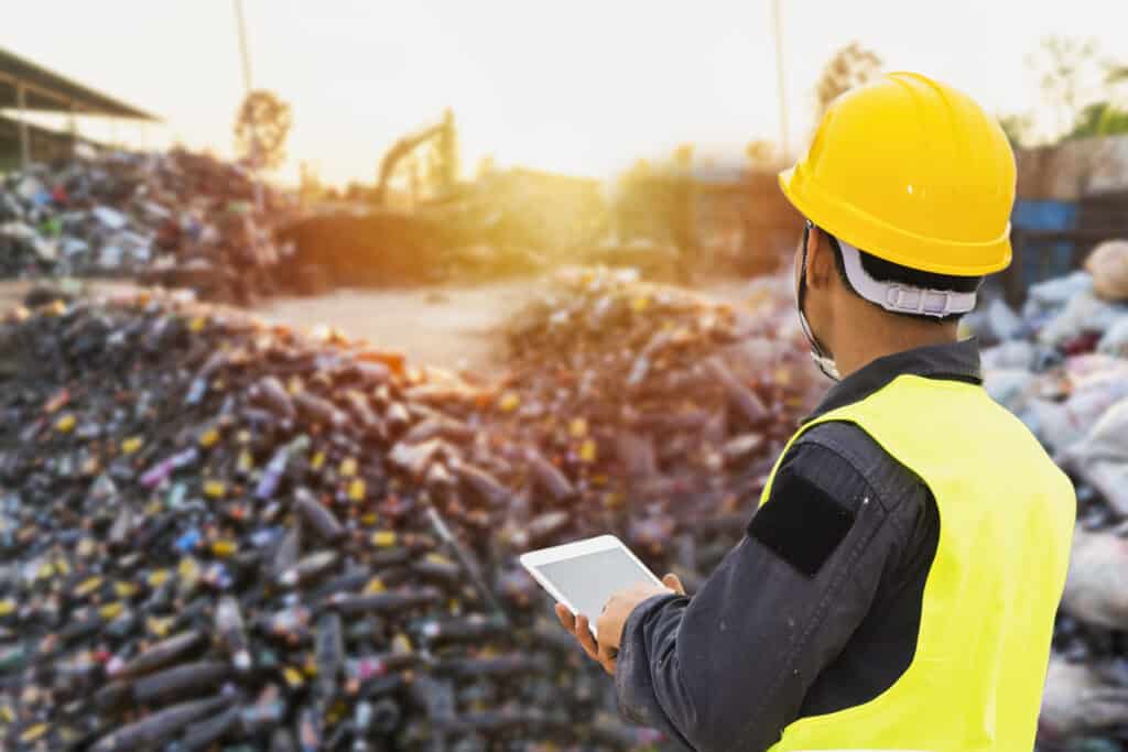 Facility manager checking environmental and sustainability compliance